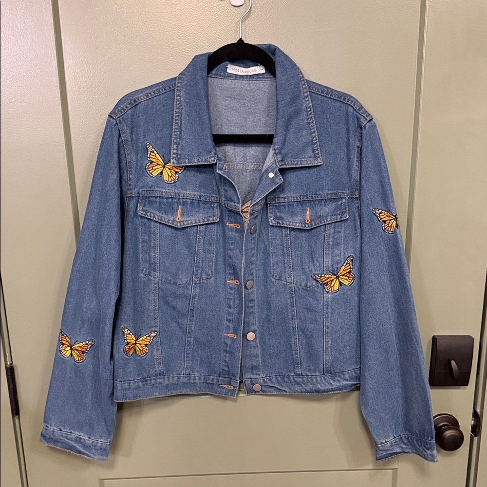 Blue Denim Jacket with Embroidered Orange Butterfly Accents